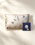 Decorative pillow with bird pattern and a box labeled 'Oriana' on a beige background - Lian Collection