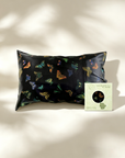 Butterfly-patterned pillowcase on a light background with a brand card - 100% 6A Grade Mulberry silk