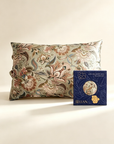Floral-patterned pillow and a Ulan tea box on a beige background - 100% 6A Grade Mulberry silk