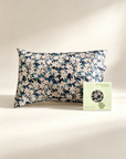 Floral-patterned pillowcase on a light background with a brand label - 100% 6A Grade Mulberry silk