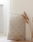 Floral patterned pillow on a white surface with a neutral background - 100% 6A Grade Mulberry silk