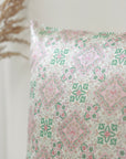 Patterned fabric with green and pink design on a neutral background - 100% 6A Grade Mulberry silk