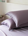 Purple bedding set with Tencel logo on a white background - TENCEL™ Lyocell