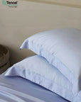Light blue bedding set with Tencel logo on a neutral background - TENCEL™ Lyocell