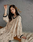 Pink gauze cotton pajama set for women by Lian Loungewear, featuring a comfortable, relaxed fit with short sleeves and pants.