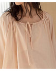 Beige bamboo cotton pajama set by Lian Loungewear with long and short pants for comfortable sleepwear.
