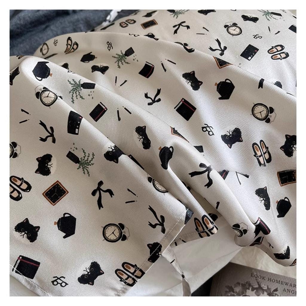 Hidden zipper detail on silk pillowcase, luxury bedding texture.