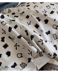 Hidden zipper detail on silk pillowcase, luxury bedding texture.