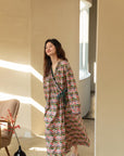 Model wearing an elegant bamboo cotton robe with oriental patterns, featuring a relaxed fit and a green sash, perfect for loungewear and home comfort