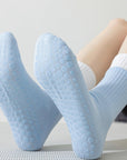 Lian Loungewear pink Pilates grip socks for women, cotton yoga socks with non-slip soles, relaxed fit for barre and workout sessions.